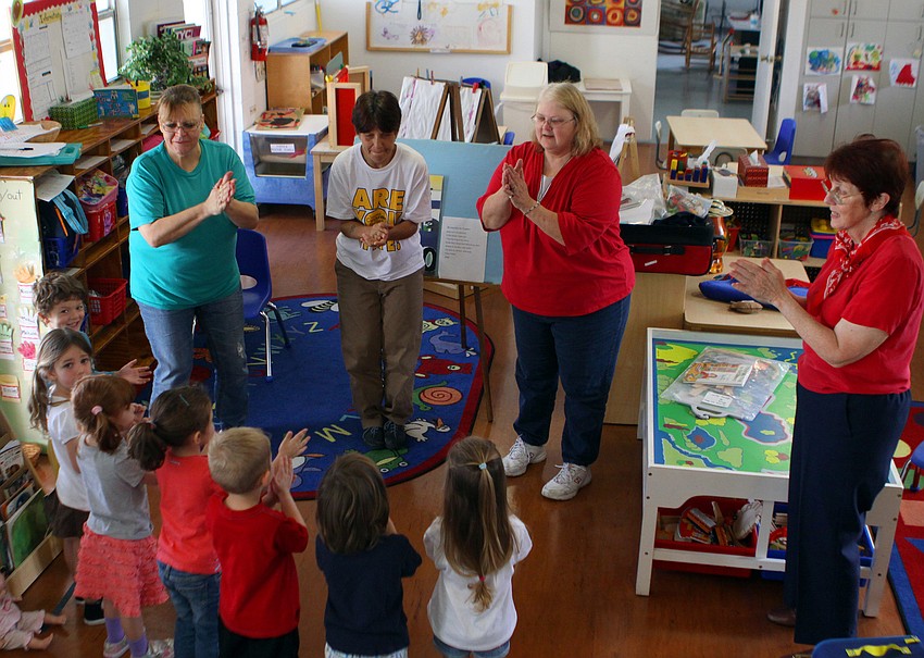 The students and teachers at St. Boniface Preschool sing and dance along with the librarians from and Gulf Gate Library, Monday, Feb. 27, at St. Boniface.