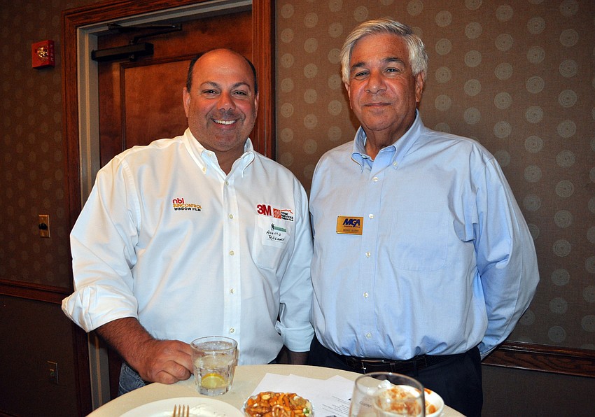 Angelo Ragone of NBI Sun Control and Bernard Barrie of MGA Insurance spent the evening networking.