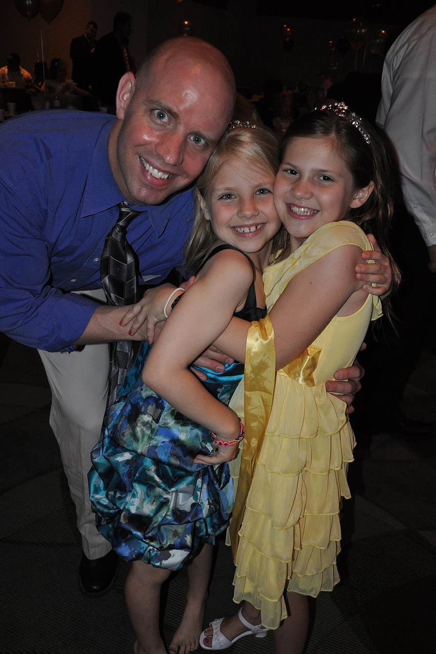 Jeremiah Chambers danced with his daughter, Savannah, and niece, Selah Swanson.