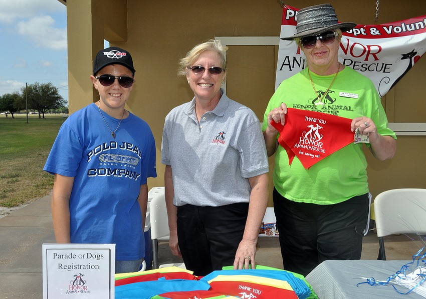 Lakewood Ranch High freshman Ryan Jaworski, Denise Smith and Marcia Lenski all volunteered their time.