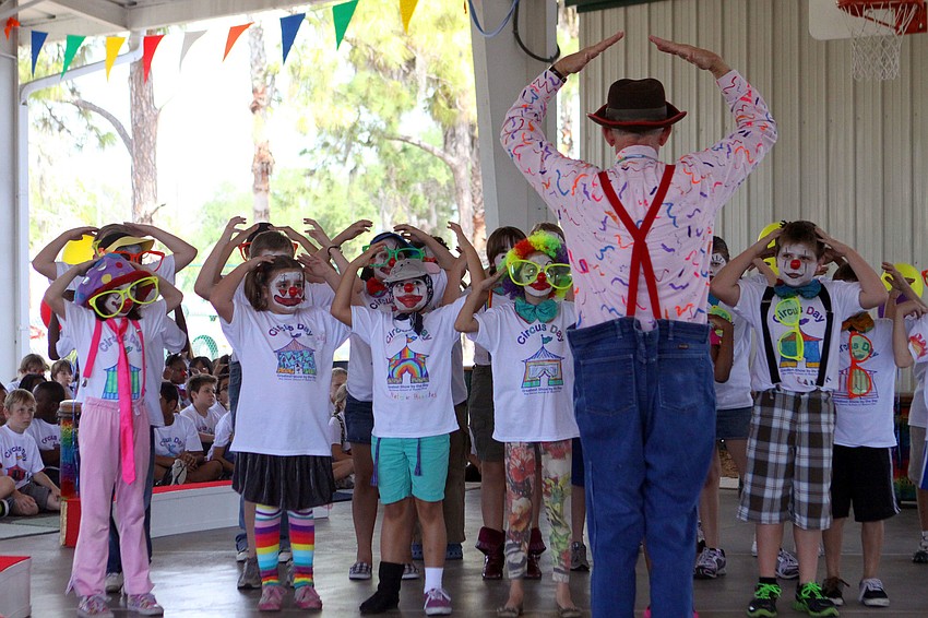 The fourth graders follow Circus Sarasota's Robin Eurich during a sketch at Circus Day at Bay Haven Elementary.
