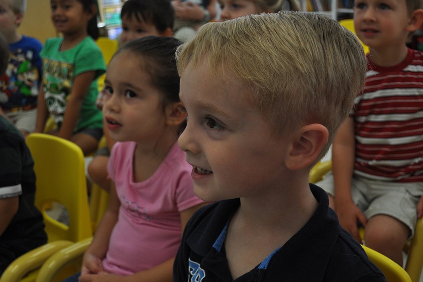 Landon Pittman, front, was eager to see all the reptiles.