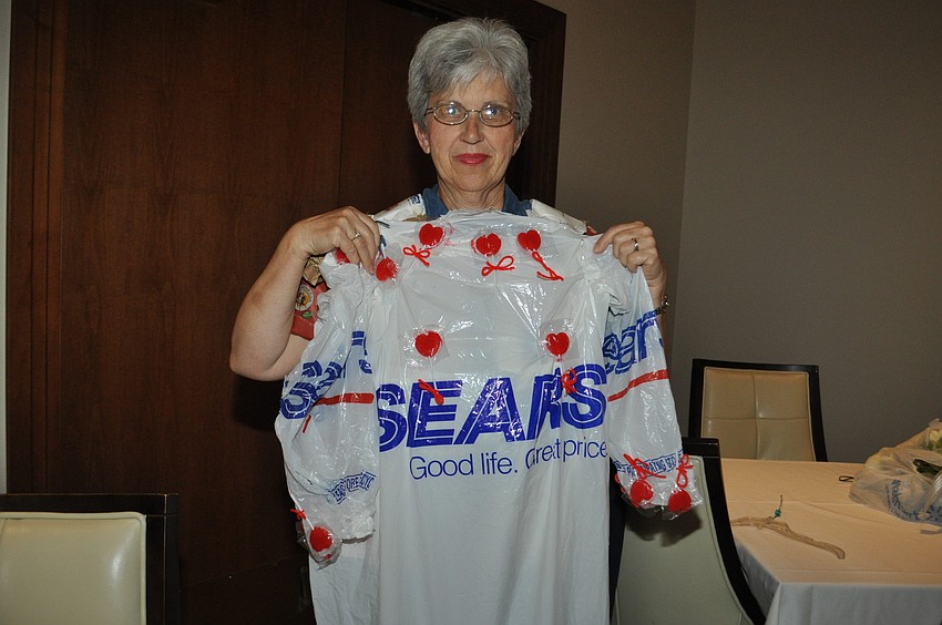 Marilyn Aldrich displays her Sears-sucker dress