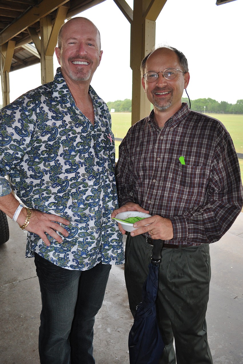 Greg Green, of Shinn & Co., with Jim Baar, of Pinebrook Ironwood Golf Club