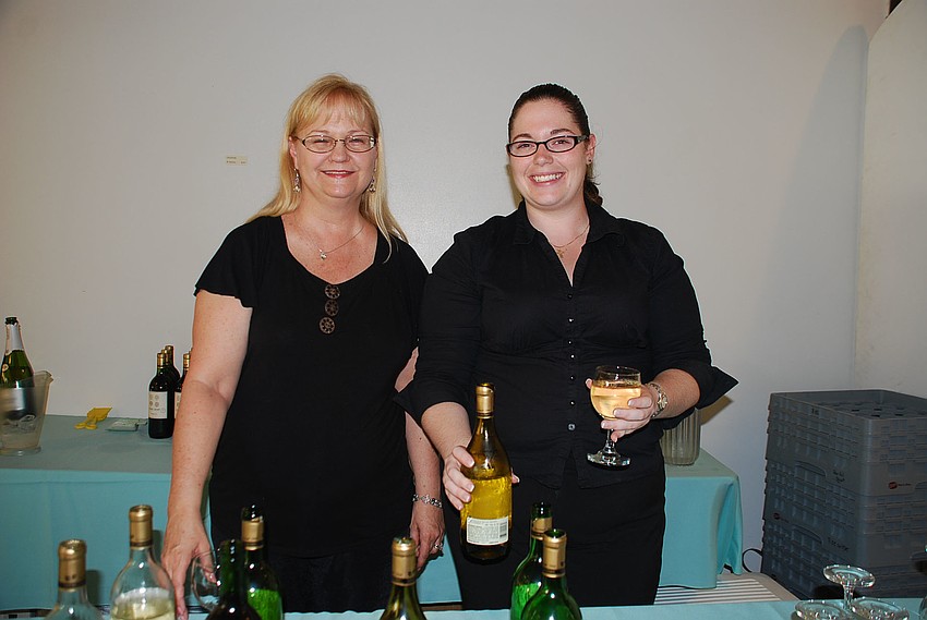 Volunteers, as well as sorority sisters, Jennifer Mida and Katie Carbarry