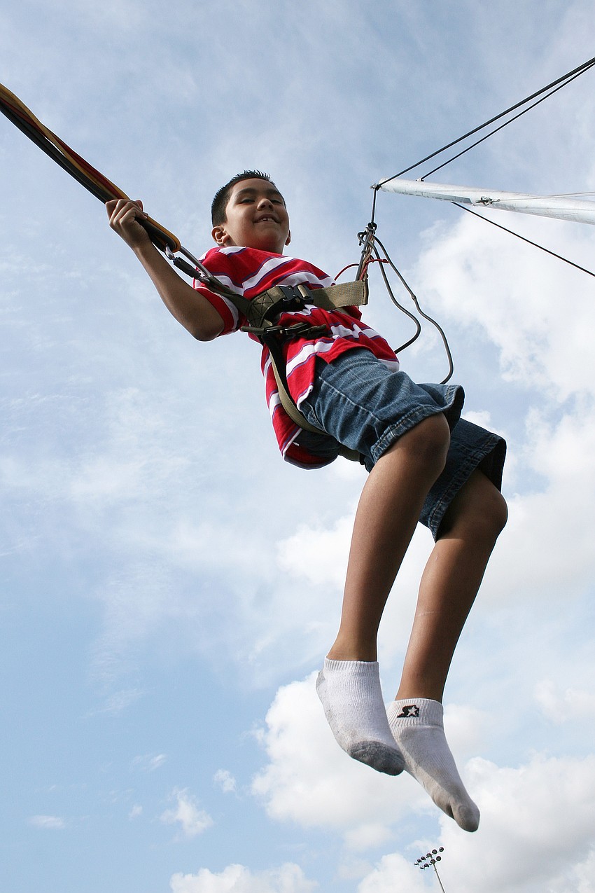 Mark Villanueva, 7, reached new heights on the bungee challenge.