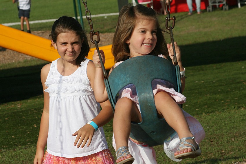 Abby Mardin, 2, caught some big air on the swing.