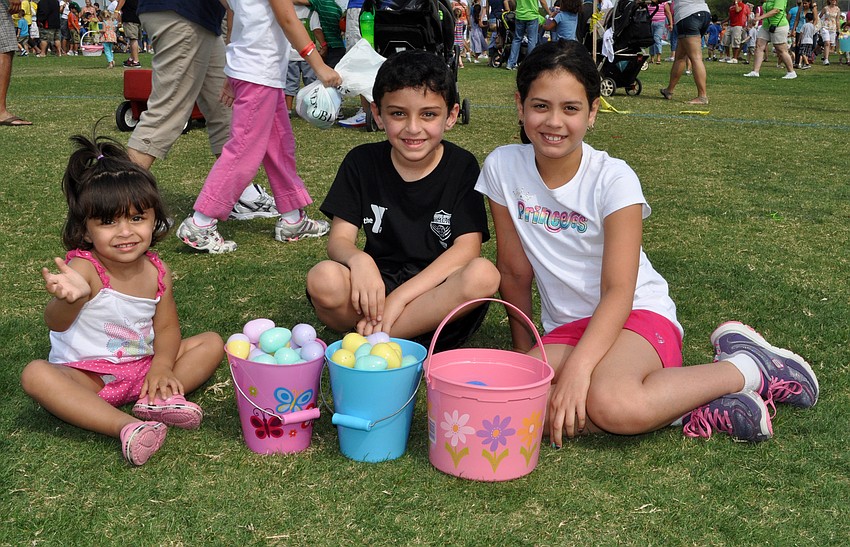 Solymar Cardona, 2, Franco Cardona, 6, and Valeria Rivera, 8, each collected an entire basket full of eggs.