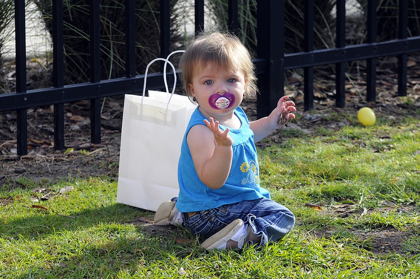 Sophia Cosner waved to the Easter Bunny from afar.