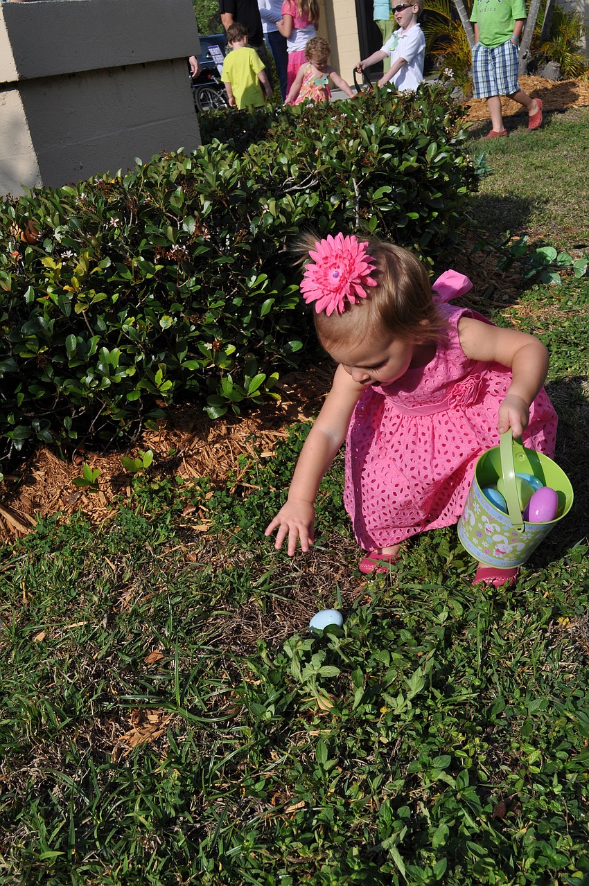 Kennedy Golm hunts for Easter eggs.
