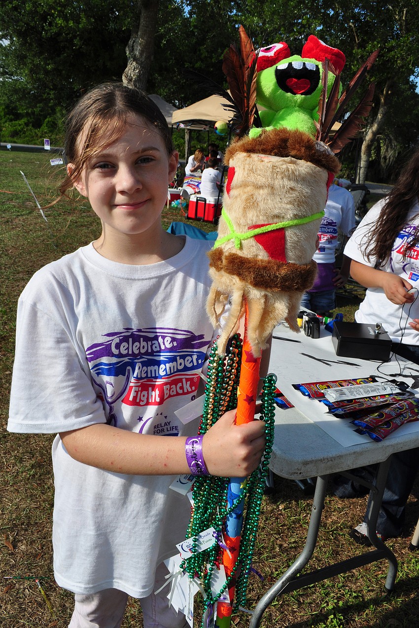 Cheyenne Berger showed off her team's spirit stick.