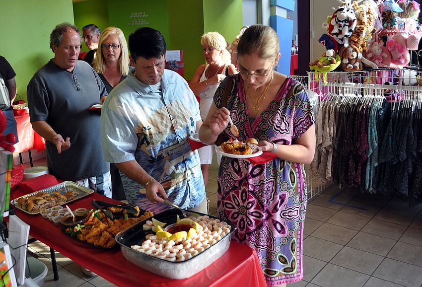 People tried different hors dâ€™uorves inside G. Wiz, Friday, April 13, at the Second Annual Simply Sarasota Kitchen and Garden Festival Kick-Off Party.