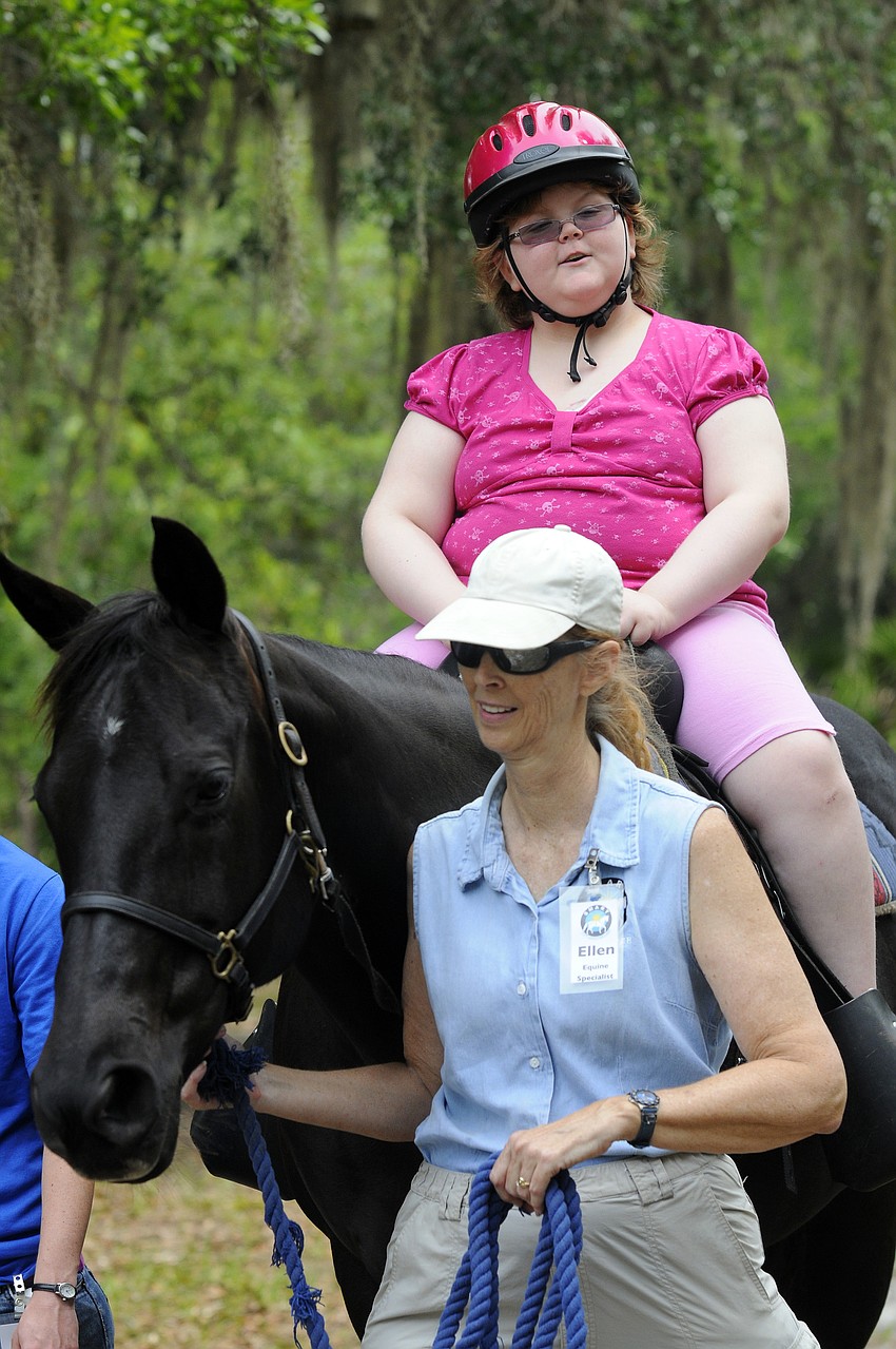 Eight-year-old Lea Sellwood rode for years before battling leukemia.
