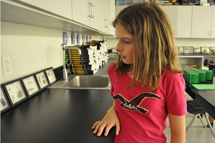 Natalie Merrill checked out a science classroom.