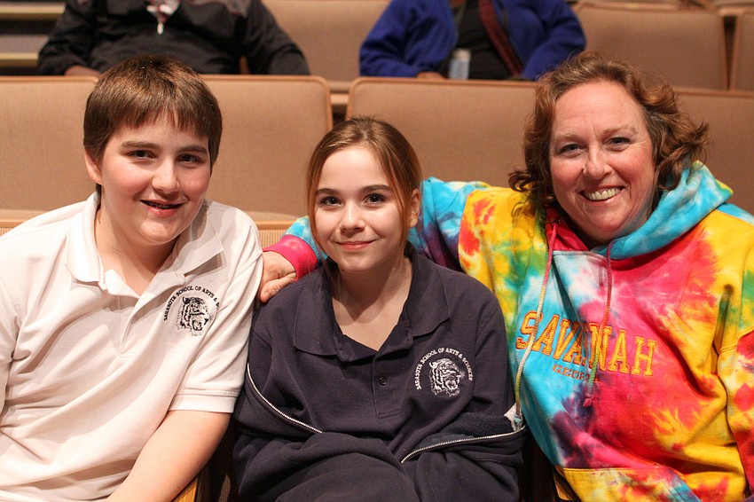 Cameron Cruce, 13, Emily Cruce, 11, and Marcia Cruce attended the Booker High Magnet Night for Visual Performing Arts, Thursday, Jan. 19, inside the Booker High auditorium. Cruce hopes to go to VPA and be part of the technical theater department.