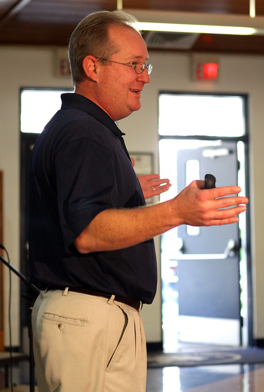Dan Strzempka talks to all the students at Out-of-Door Academy lower school, Friday, Jan. 20, in the cafeteria.