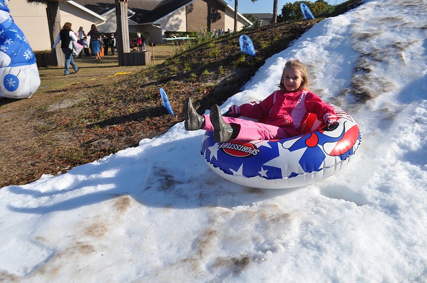 Anna Smith, 6, was all smiles as she rushed down the hill.