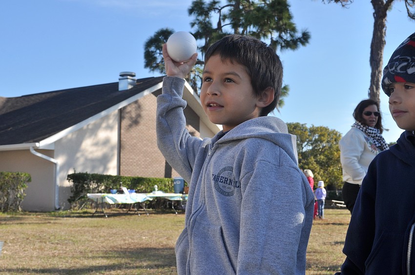 Lucas Schmidt, 5, tried his hand at the snowball toss.