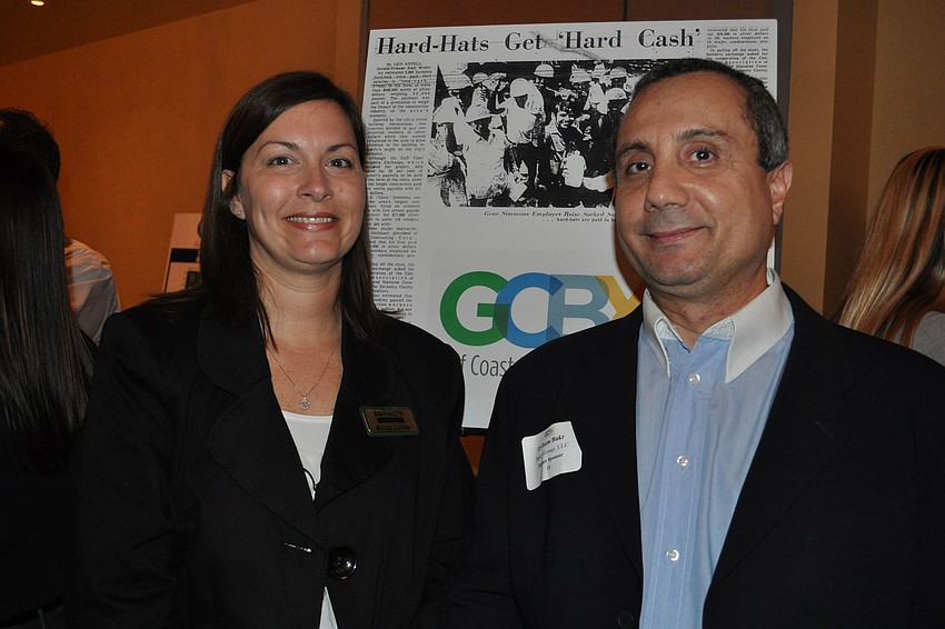 Rachel Layton, of Kirk-Pinkerton, with Hytham Bakr, of Bakr Group