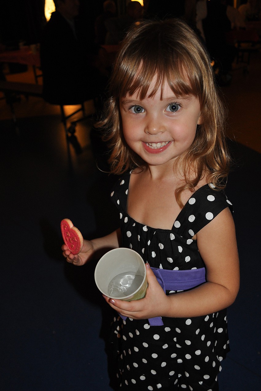 Kendall Johnson showed off her cookie to her dad, Devin.