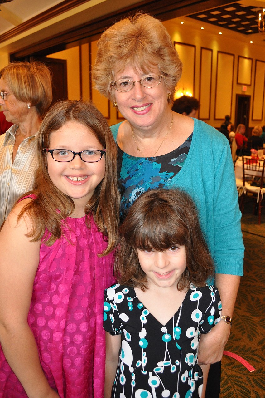 Diane McLaughlin, behind, brought her granddaughters, Kaitlyn Ganci, left, and Madeline Gancy, right.