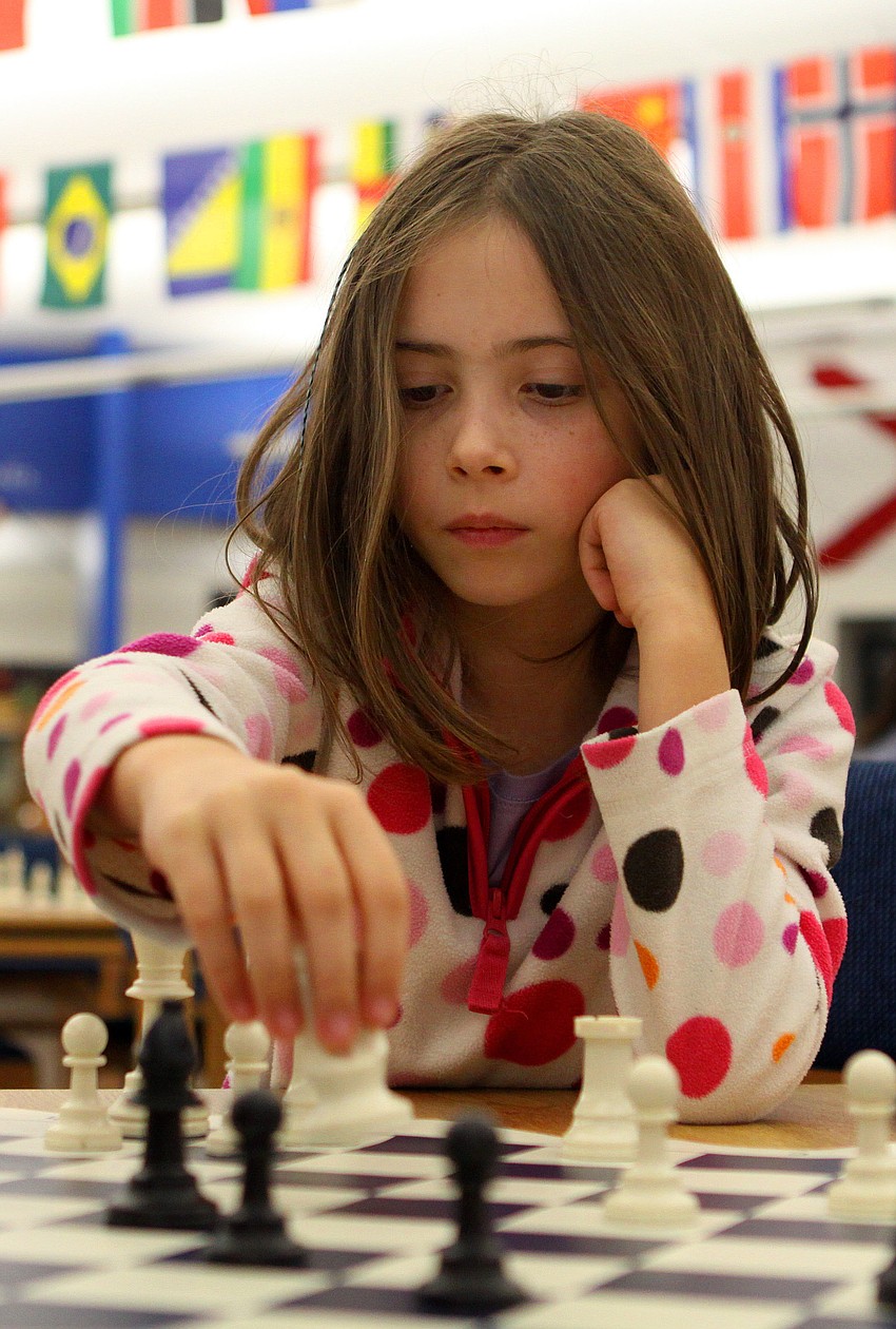 Karina Bodor makes a move during her game against Aden McKinney.