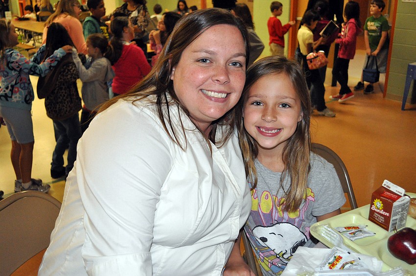 Six-year-old Jorja Heine was excited to eat lunch with her mom Amy.