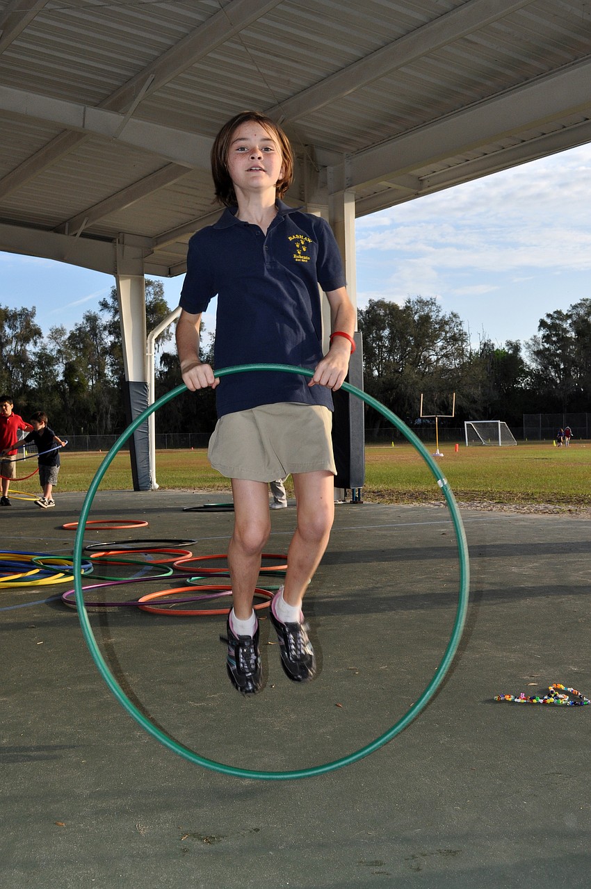 Third-grader Haleigh Connelly demonstrated a new way to hula-hoop.