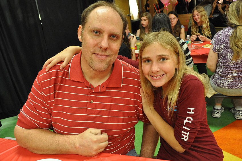 Scott Volpe, with his daughter, Alison, came to watch his daughter, Christina, sing.