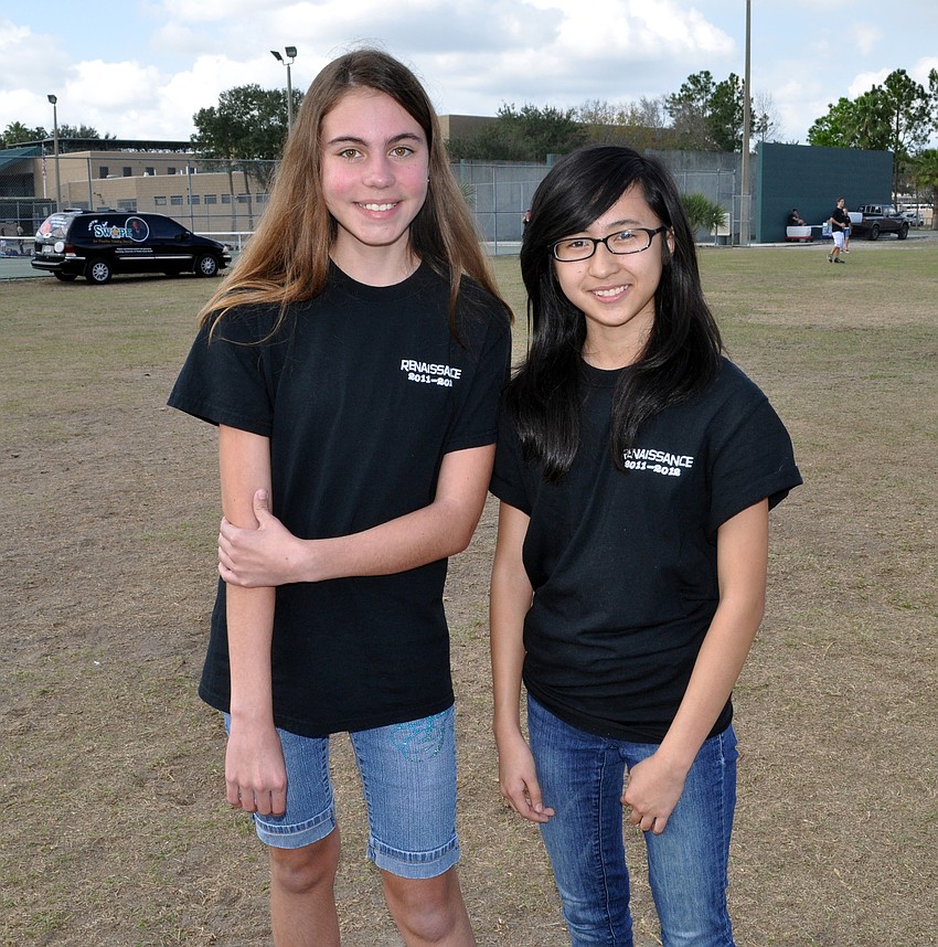Eighth-graders Abrielle Leeder and Bao Vu couldnâ€™t wait to check out the bounce houses.