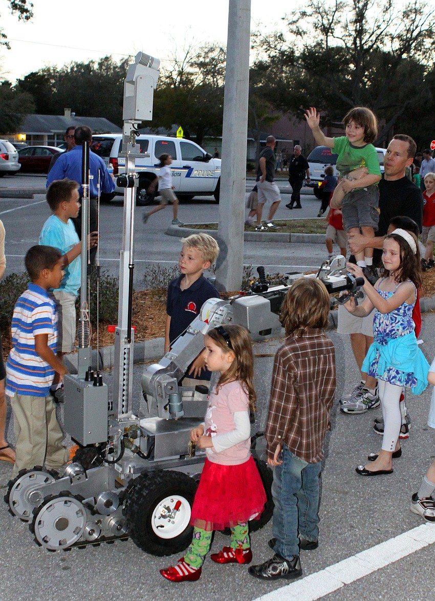 Students and parents had fun seeing themselves on TV and playing with the Remo Tech bomb robot, Thursday, Feb. 16, during Science Night at Southside Elementary.