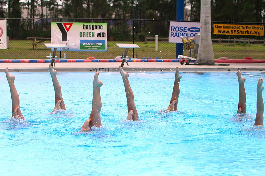 The 13-15 group do ballet legs during one of their performances on Sunday.