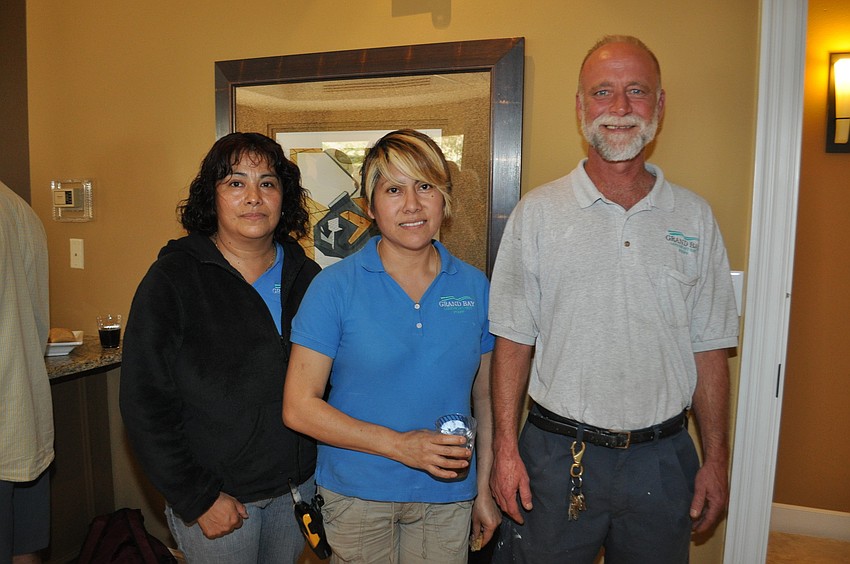 Wilsonâ€™s Coworkers Filomena Torres, Elsa Guzman and Dwayne Collins