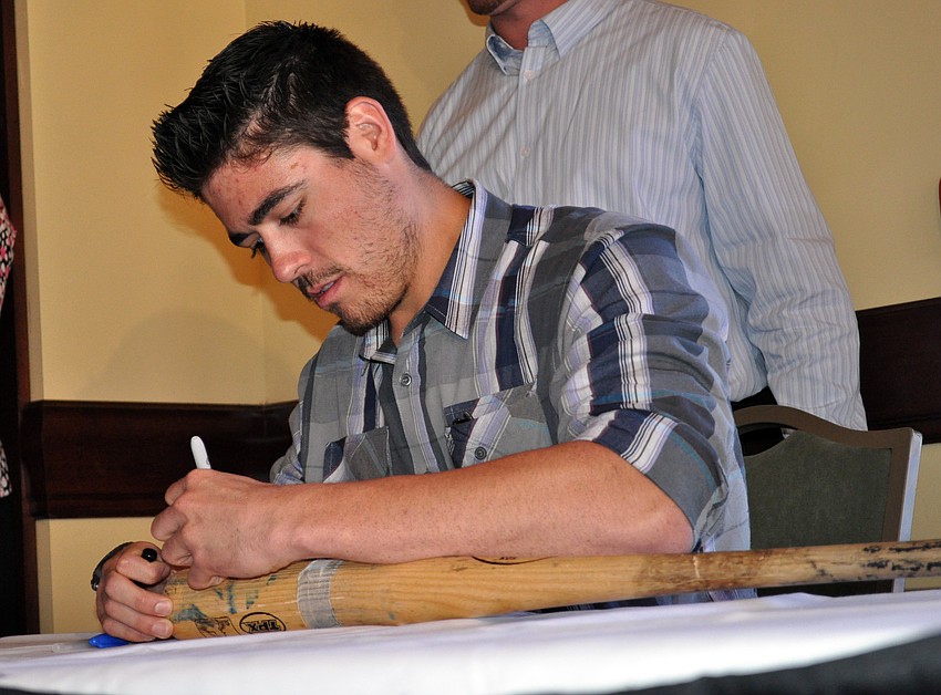 Tampa Bay Rays pitcher Matt Moore signed autographs for those in attendance.