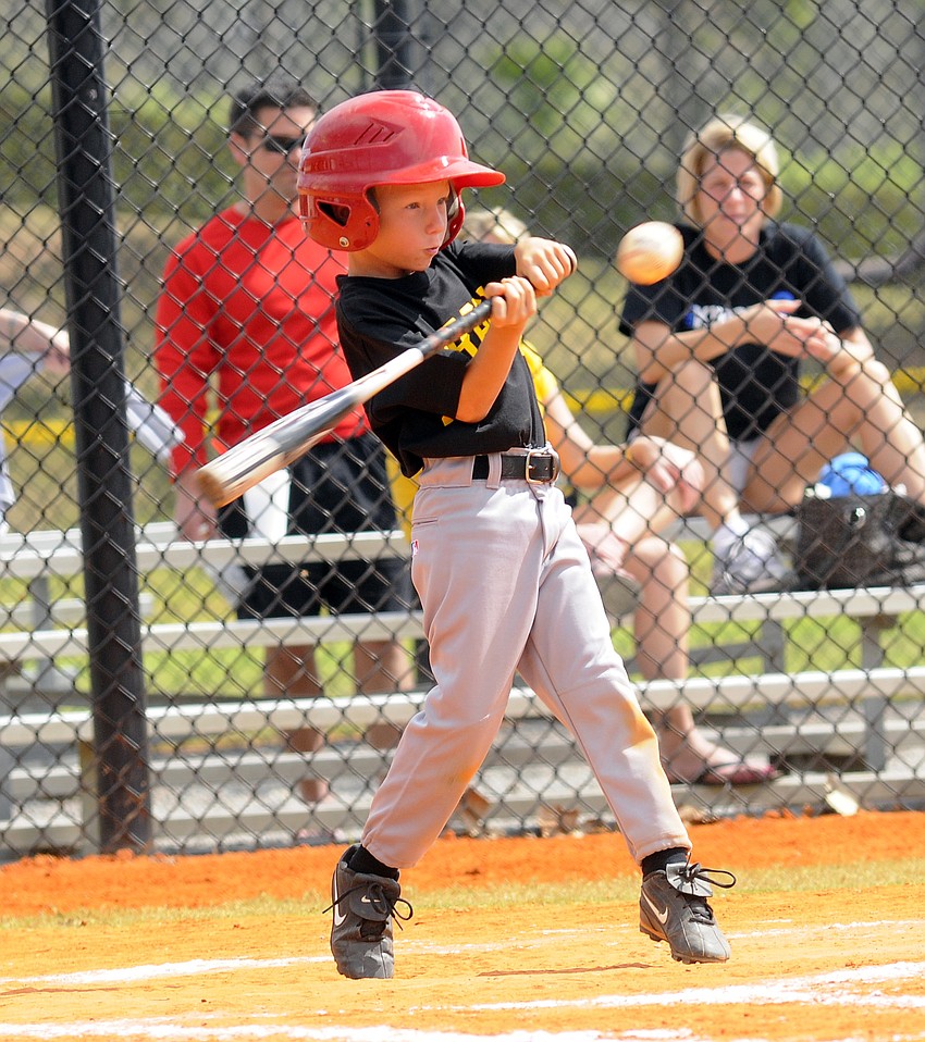 Six-year-old Ryan Swenson notched a hit for the Pirates.