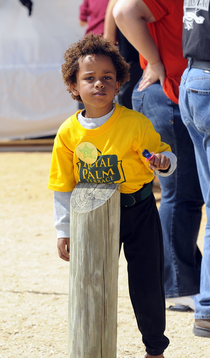Five-year-old Logan Ulloa plays T-ball.