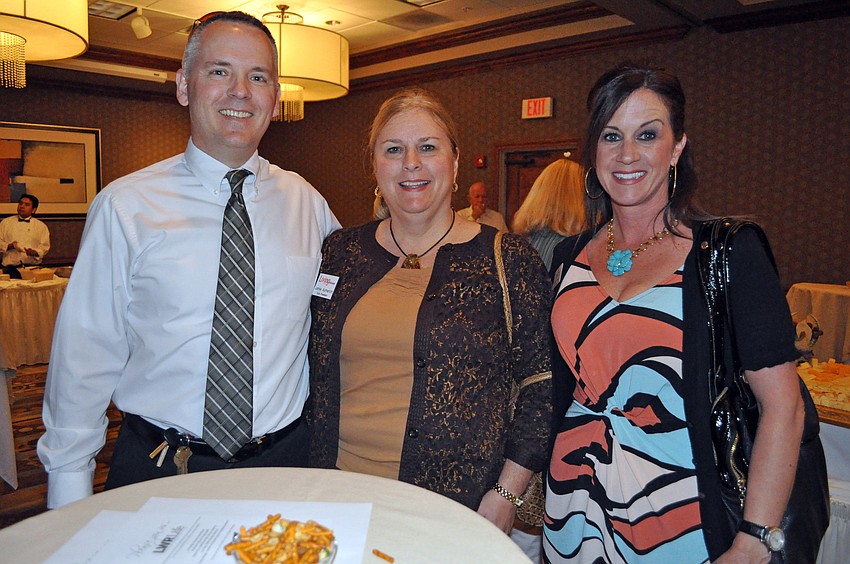 Patrick Wright enjoyed networking with Jamie Aymericj of Living on the Suncoast and Michelle Brault of the Cancer Support Community.