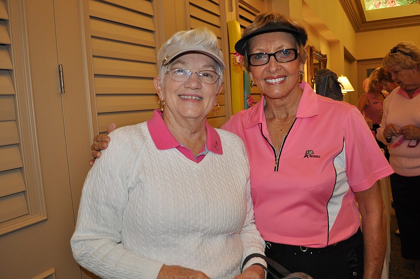 Helen Weidemann and Alberta Schmidt were eager to check out the raffle drawing items.