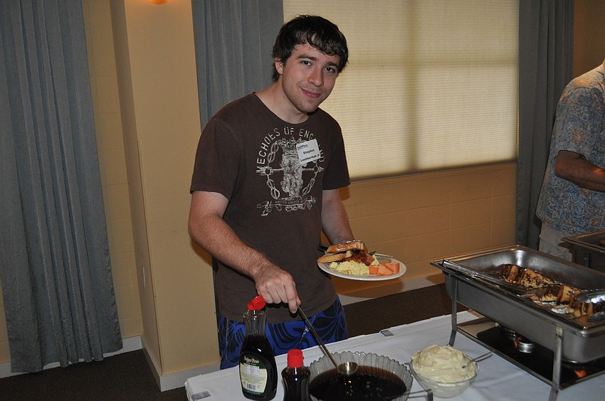 Stephen Leatherman Jr. enjoys breakfast.
