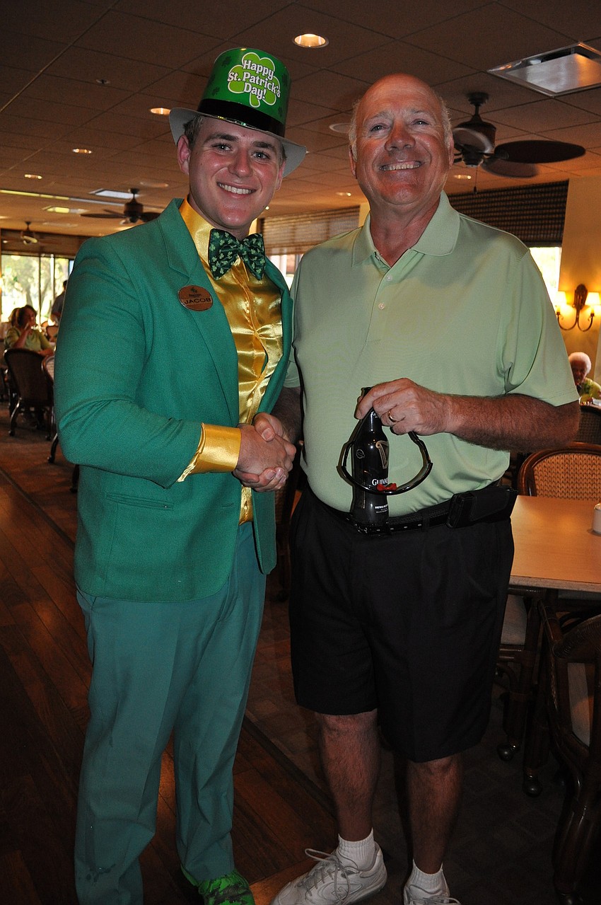 Palm-Aire employee Jacob Goodwin with Steve Miller