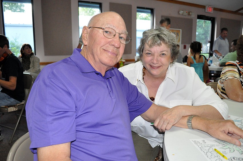 Oak Run residents Jack LaFontaine and Cheryl Ferreira decided to have a coloring contest after dinner.