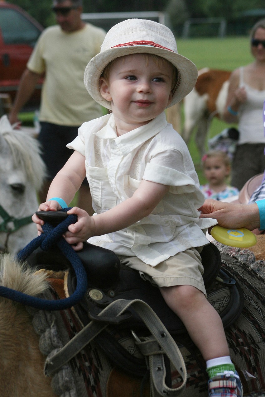 Carson Wynn, 18 months, took a pony ride.