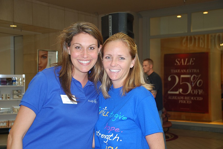 Volunteers Lea Mei and Blair Williamson