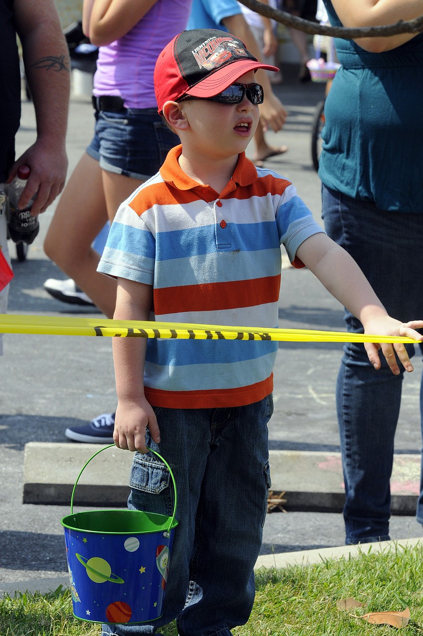 Five-year-old Zachary Grebe anxiously waited for the egg hunt to start.