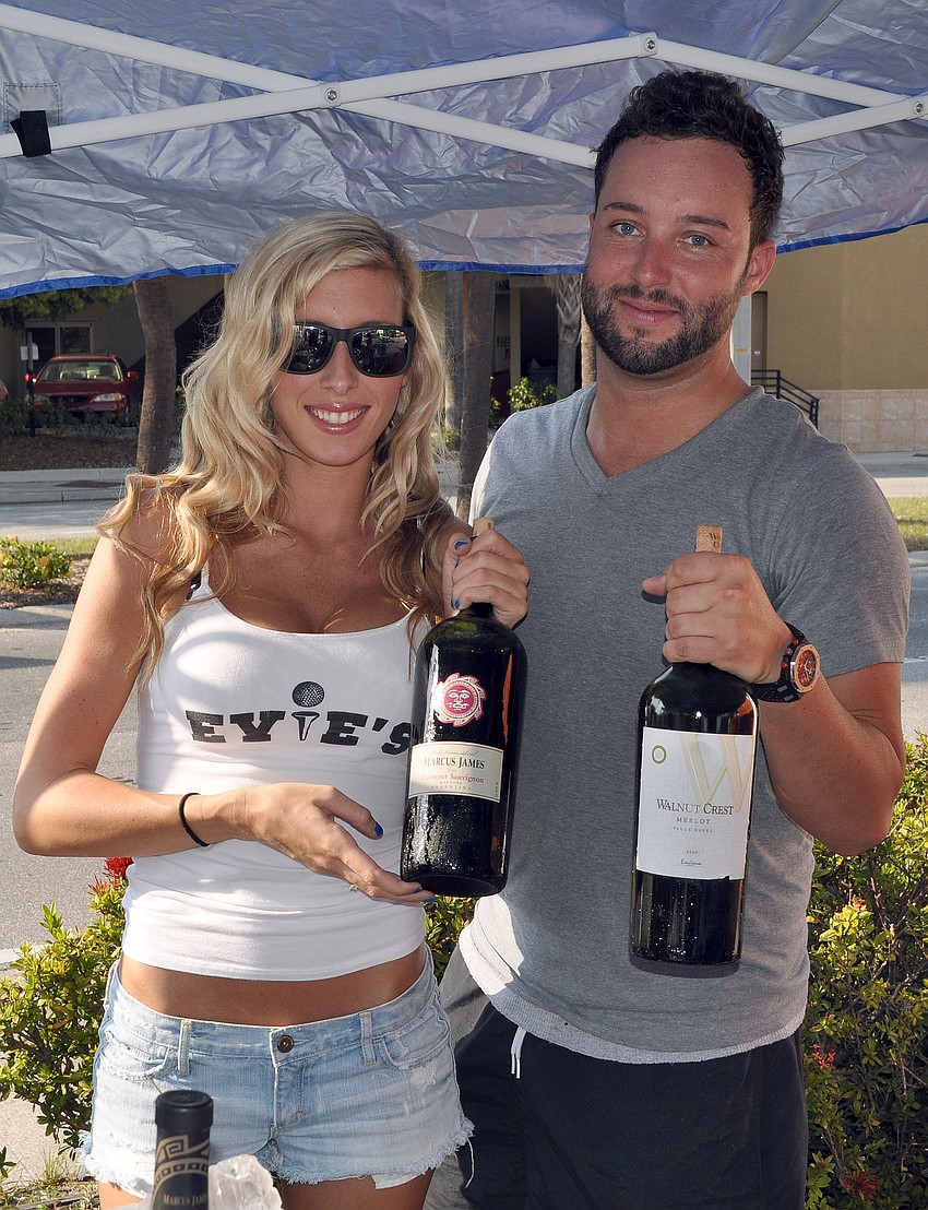 Chelsea Lippincott and Nick Vaccaro served up wine and beer from Evieâ€™s Tavern during Spring Fling at Ringling Picnic on Friday.