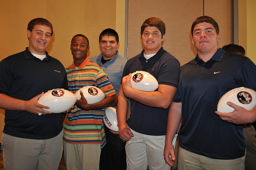 Austin Reeves, Trekel Trapp, Brooks Larkin, Michael Galati and Dylan Beauchamp play football for Manatee High School.