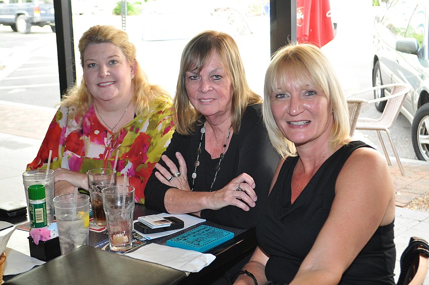 Kim Dolnick with Herbal Choices and Massage, Helen Brightbill Daruszka with Arcade Printing and Dawn Mims with LLSA Chamber of Commerce.