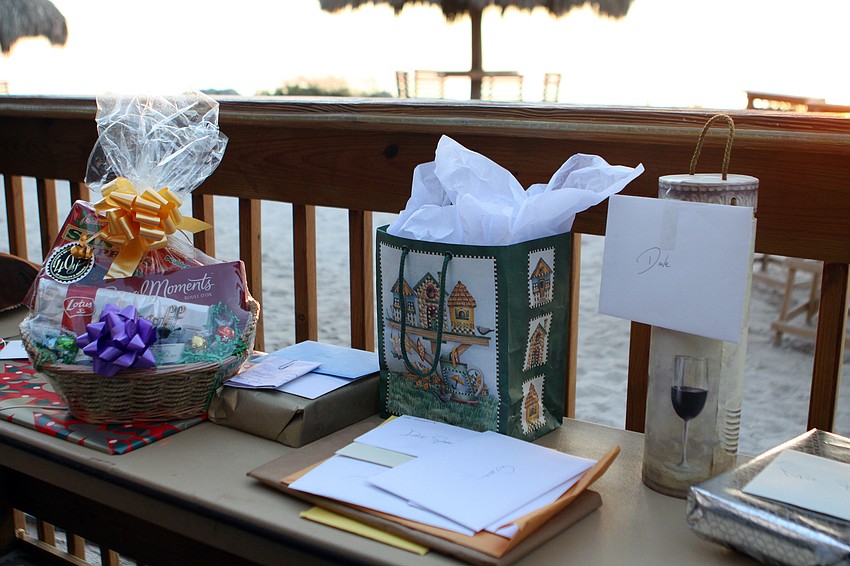 Many people brought cards and gifts for Dave Sparks at his goodbye party, Thursday, Jan. 5, at the Gulf Drive CafÃ©.