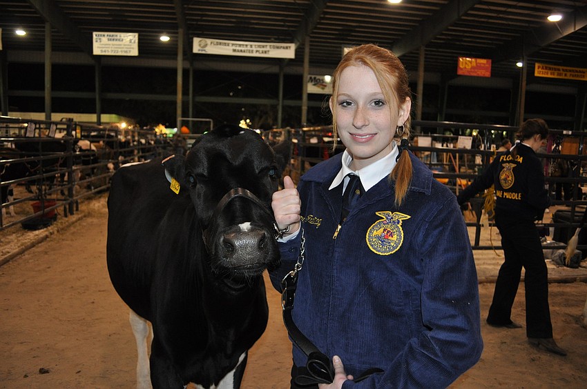 Nolan Middle School student Summer Freitag, 12, showed the chapter cow, Lady.