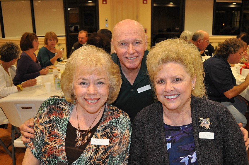 Betsy Chartier and her husband, Woodie, enjoyed their meal with Sandy Berberich.
